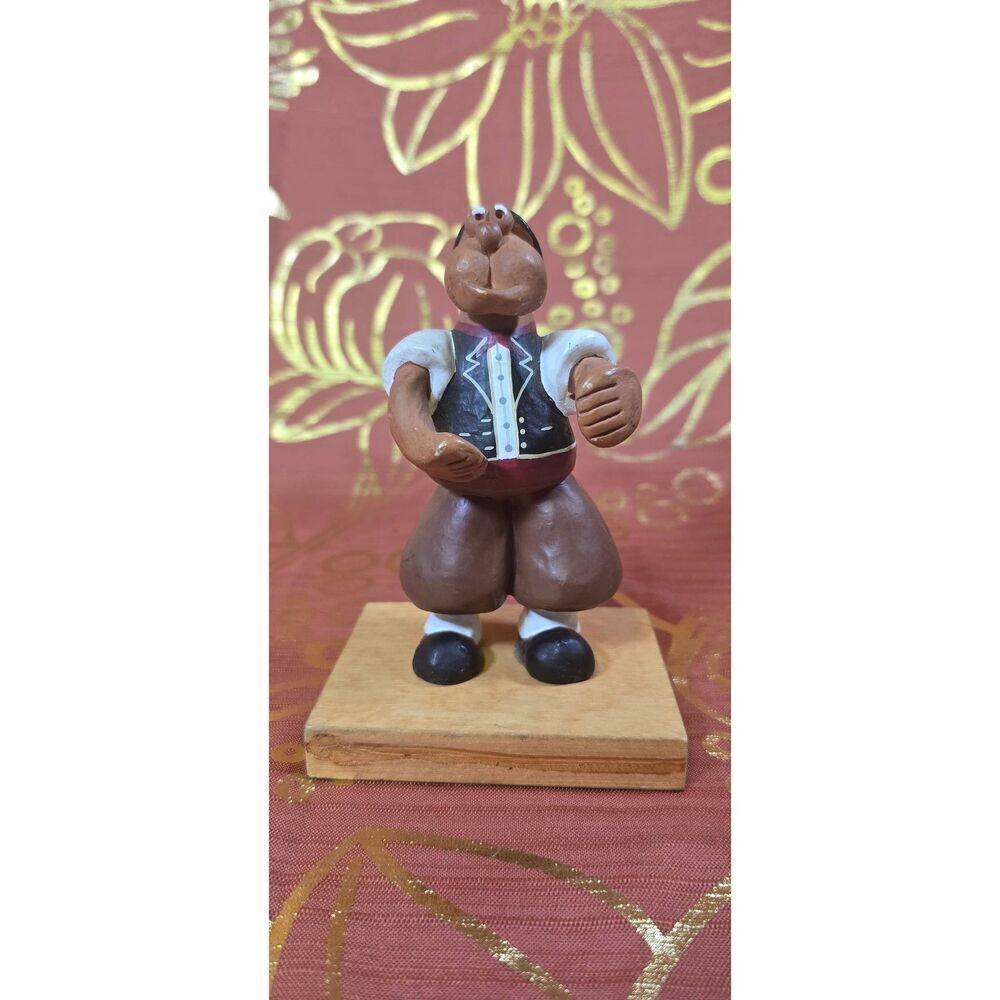 Draft ListingVintage Folk Art Clay Figurine Man on Wooden Base – Hand-Painted Eu